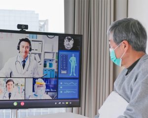 Doctor and Patient dealing with the pros and cons of telemedicine